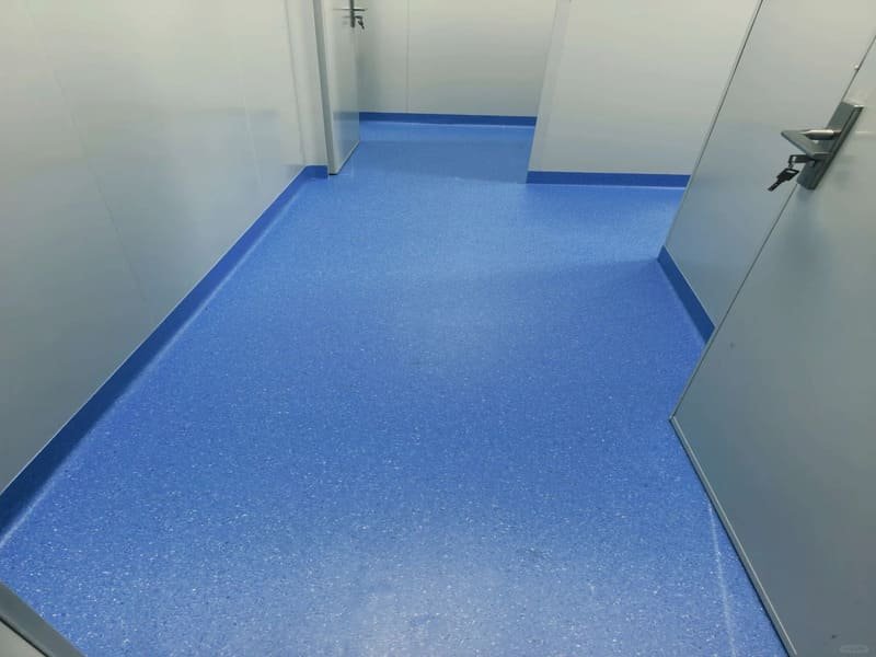 spot cleaning stains on vinyl flooring with toothbrush
